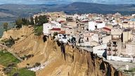 A drone picture shows houses perched along the edge of a cliff after a landslide in Niscemi, Sicily, Italy, January 27, 2026. REUTERS/Danilo Arnone