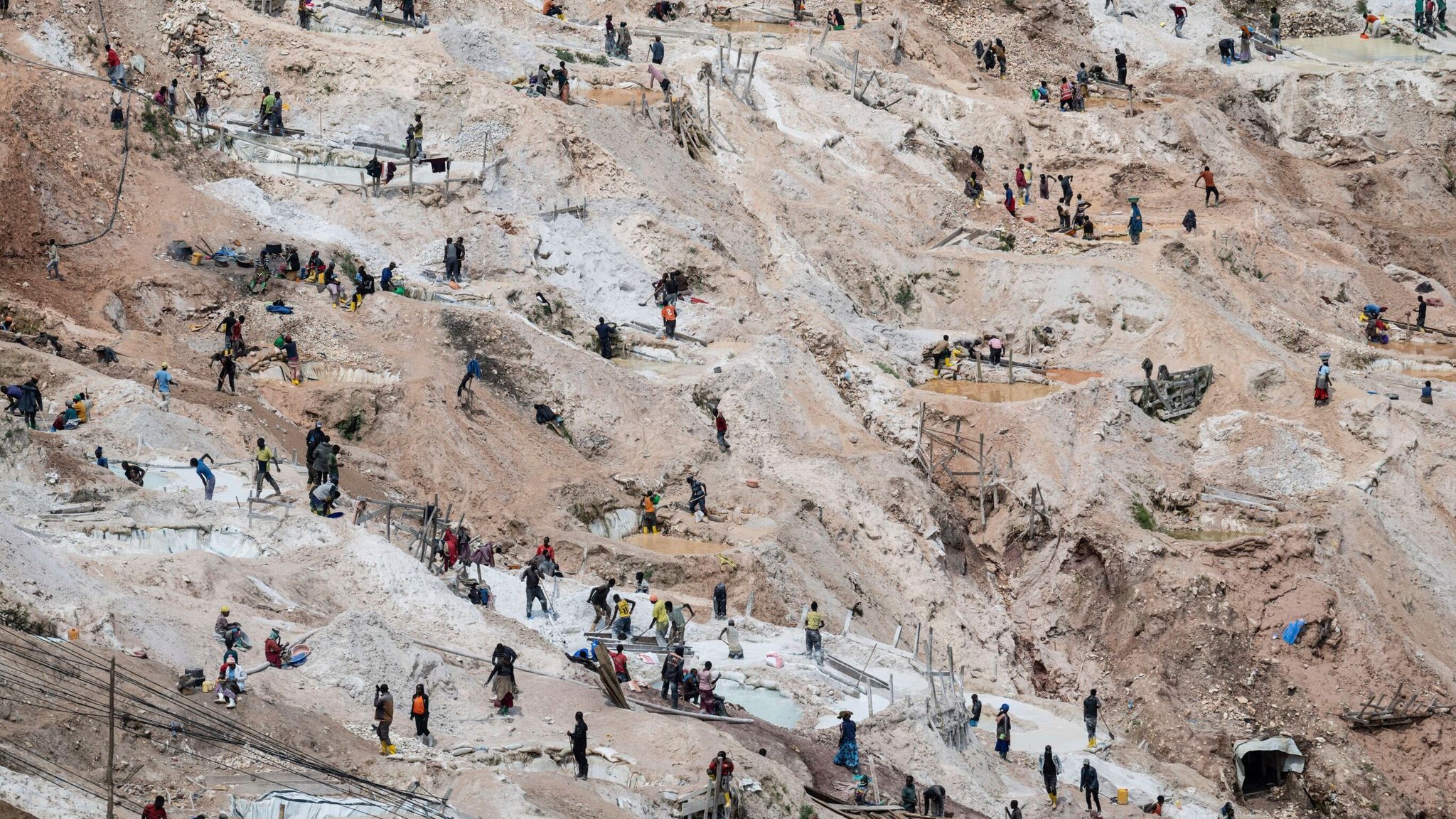 More than 200 killed after landslide hits miners extracting key ...