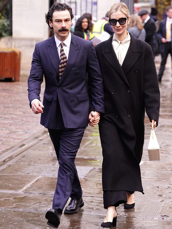 Rivals star Aidan Turner and his wife Caitlin FitzGerald. 
Pic: PA