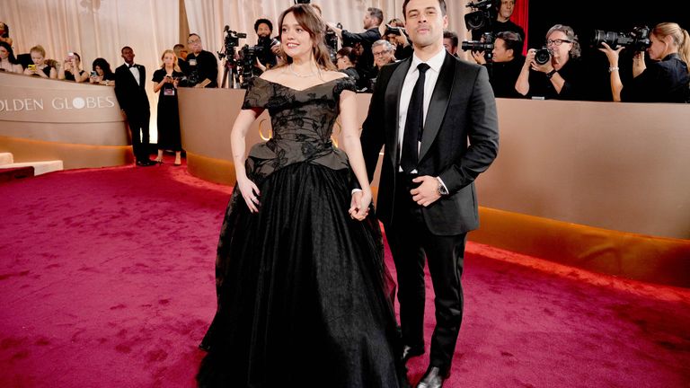 Aimee Lou Wood, left, and Adam Long. Pic: Jordan Strauss/Invision/AP