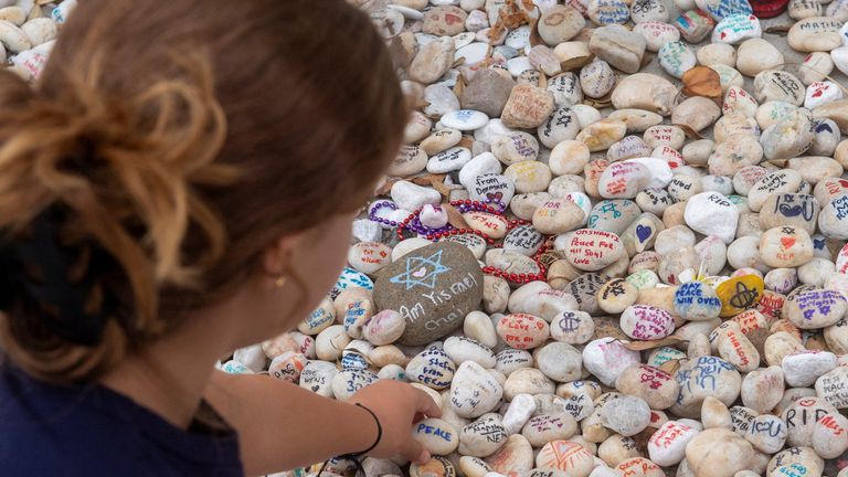Pebbles at a memorial site for those killed during the December shooting. Pic: Reuters