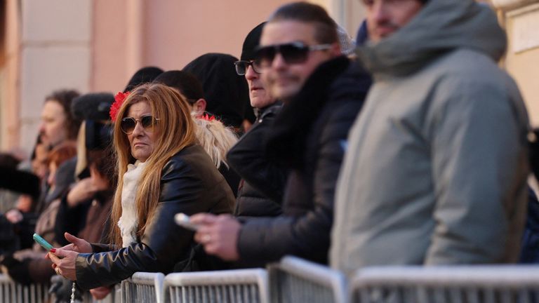 People line the streets outside the church. Pic: Reuters
