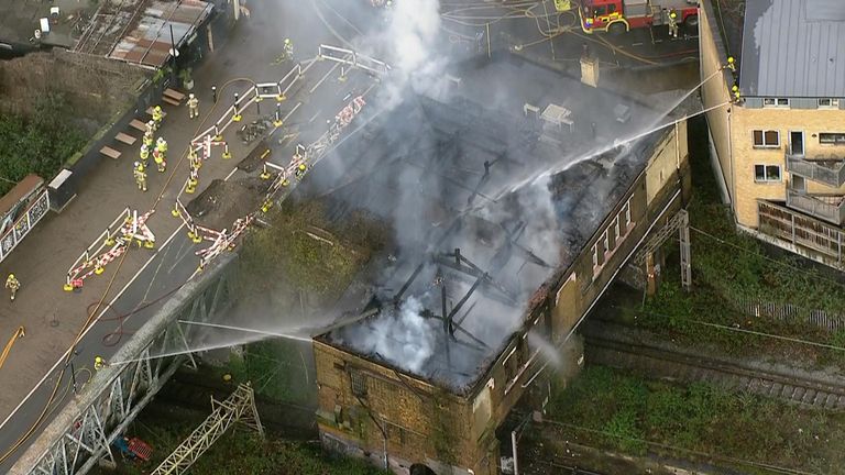 The fire happened at a building that sits above several rail lines. 
