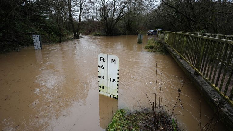 Houndsfield Lane in Birmingham is now impassable with water. Pic: PA