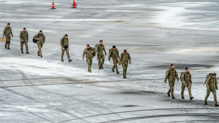 Danish soldiers land at Nuuk airport, Greenland, on Monday. Pic: Reuters