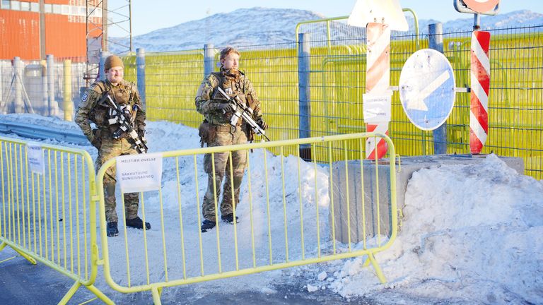 Members of the Danish military manning a checkpoint at the industrial dockland area in Nuuk. Pic: PA