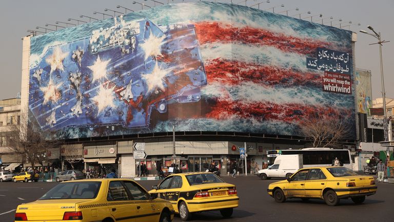 An anti-U.S. billboard on a building in Tehran, Iran.
Pic: WANA/Reuters