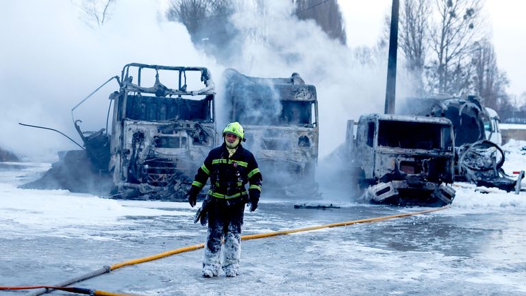 Firefighters have once again been dealing with the aftermath of drone and missile strikes in Kyiv. Pic: Reuters