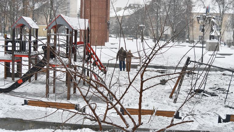 Ukrainian police officers work at the site of a Russian drone strike on a children playground in Lviv. Pic: AP
