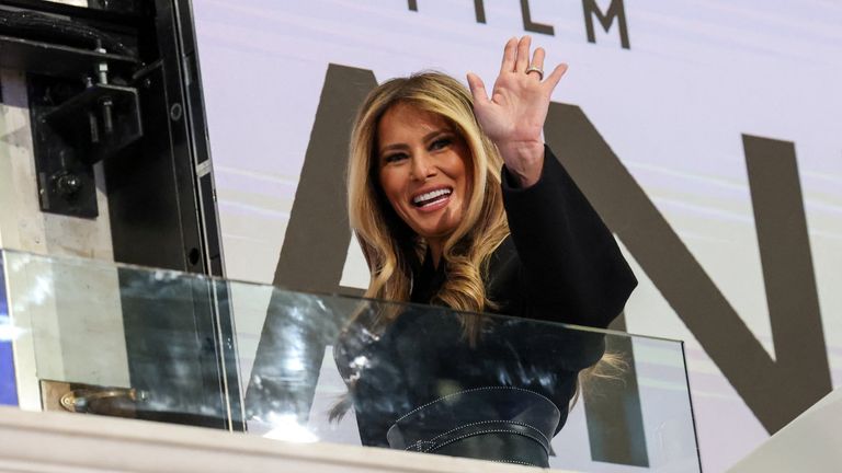 Melania Trump waves as her film is promoted at the New York Stock Exchange. Pic: Reuters