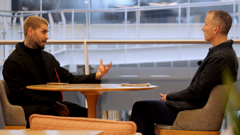 Meraj Tehrani talking to Alex Rossi