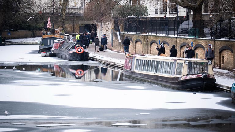 People walking in snowy conditions in Little Venice near Paddington. Pic: PA