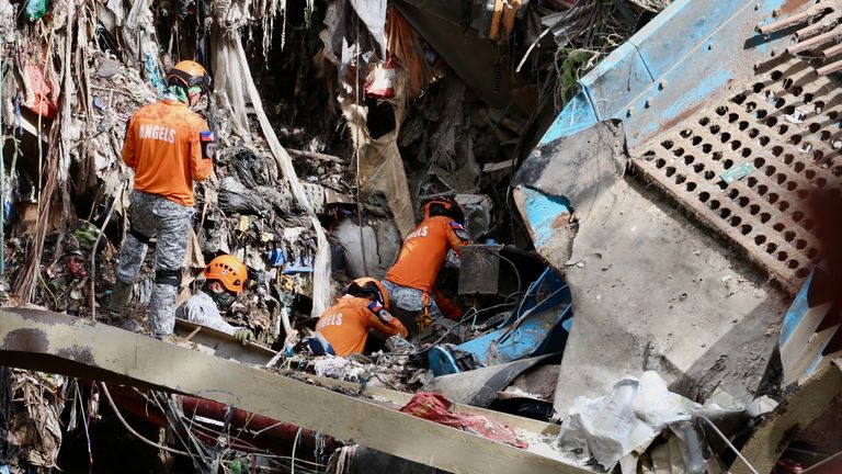 Four dead, dozens missing as 'rubbish avalanche' buries Philippines landfill