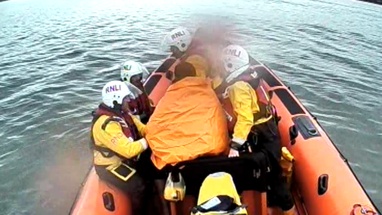 The man was taken on to the lifeboat. Pic: RNLI/Sarah Sim