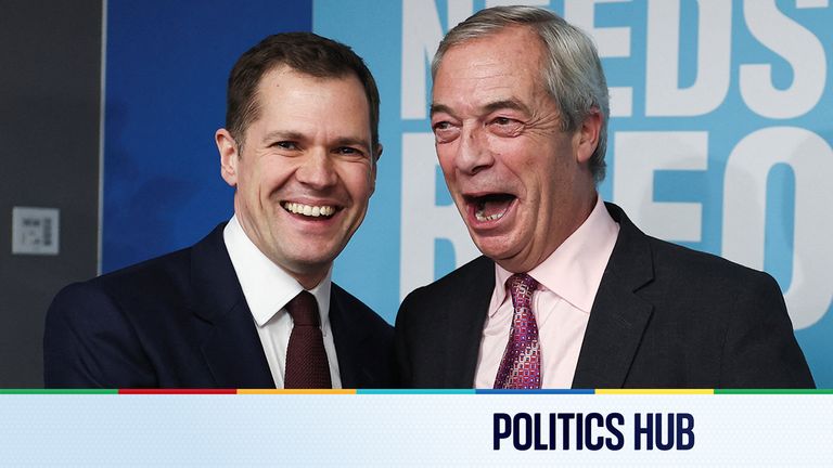 Former British Conservative Party member Robert Jenrick shakes hands with Reform UK leader Nigel Farage