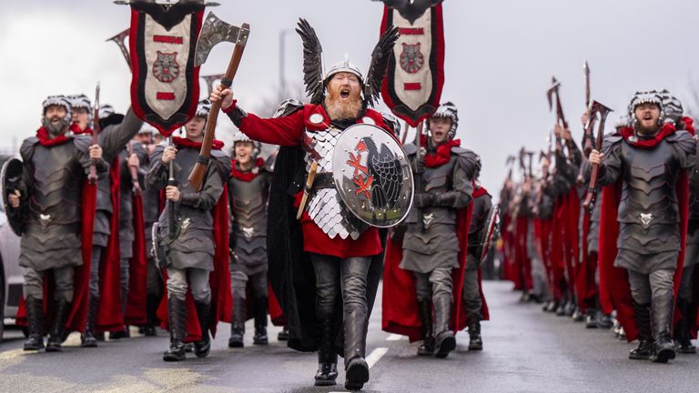 Lynden Nicolson, Guizer Jarl of the Jarl Squad, leading the parade on Tuesday. Pic: PA