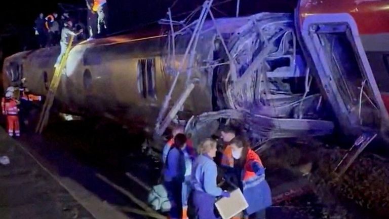 First responders search through wreckage after two high-speed trains derailed in Spain. Pic: @eleanorinthesky/Reuters