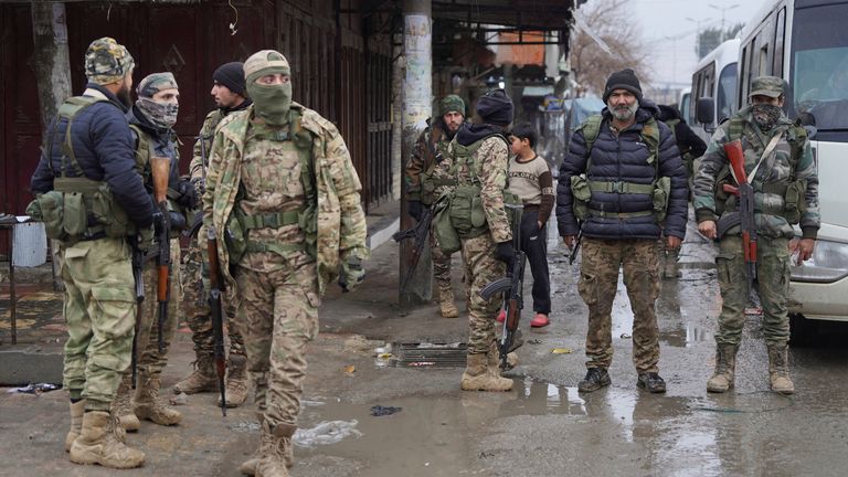 Members of the Syrian army are deployed in Tabqa after the withdrawal of the Syrian Democratic Forces (SDF). Pic: Reuters