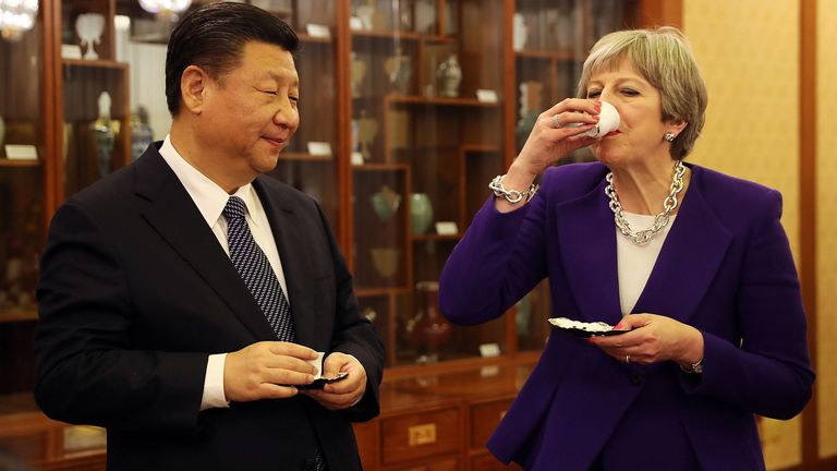 President Xi and Theresa May in 2018. Pic: PA