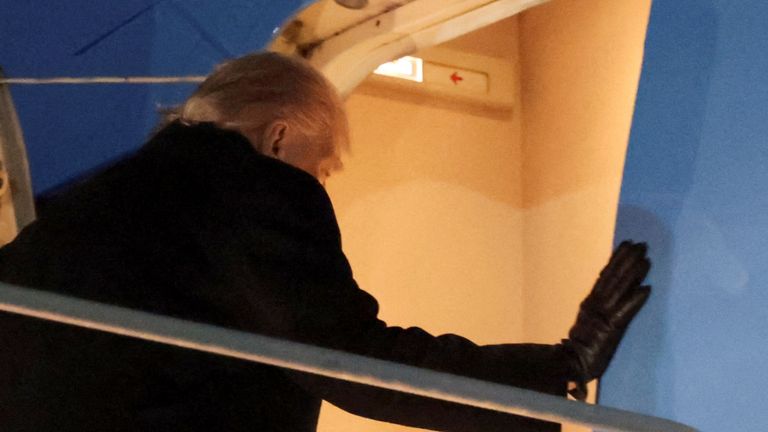 Trump boarding Air Force One on Tuesday night. Pic: Reuters
