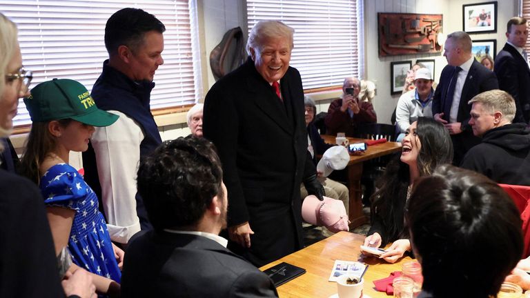 Trump greets fans at the Machine Shed restaurant in Urbandale before his rally. Pic: Reuters