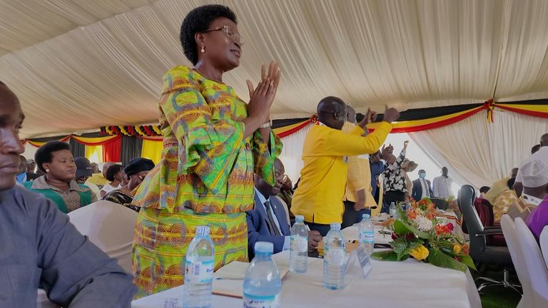 Supporters of President Yoweri Museveni cheer as his landslide victory is announced