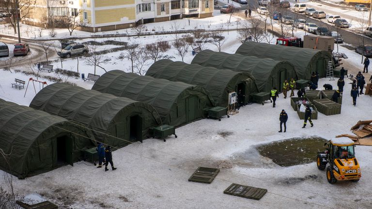 Tents set up for people to warm up and sleep at night in Kyiv. Pic: AP