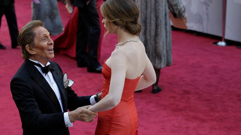 Valentino with Anne Hathaway. Pic: AP
