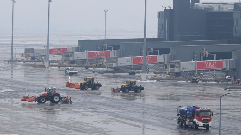 Snow ploughs at work at Vienna International Airport. Pic: Reuters