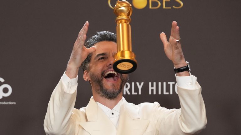 The Secret Agent star Wagner Moura celebrates his win. Pic: Chris Pizzello/AP