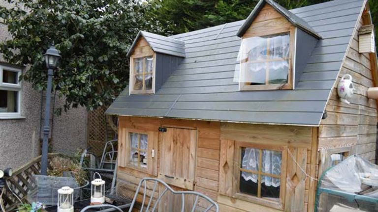 Damage to a Wendy House at a property near to the blast
Pic: Met Police/PA