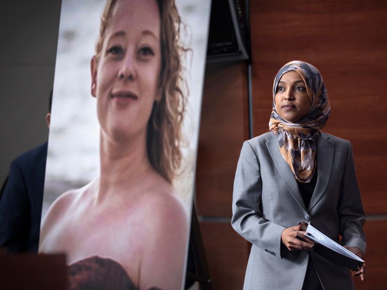 Ms Omar beside a photo of Renee Good during a news conference this month. Pic: AP