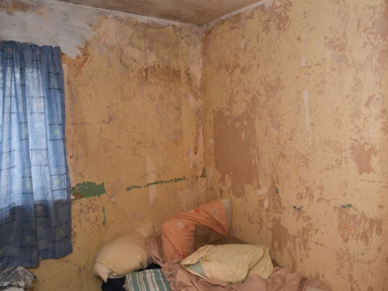 The woman's bedroom was likened to a 'prison cell'. Pic: PA