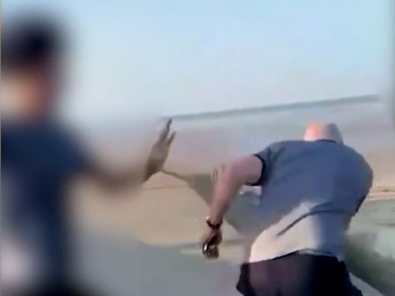 A court has been shown a video of teenagers attacking a man they thought  was a paedophile with rocks and a bottle.