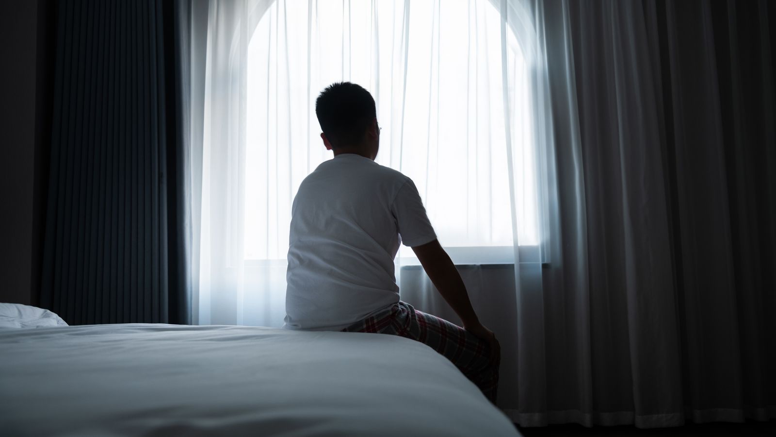 Trial into puberty blockers for children paused over 'wellbeing concerns'