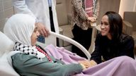 The Duchess of Sussex talks with Maria, a 14-year-old burn victim from Gaza, during a visit to the Specialty Hospital in Jordan.
Pic: PA