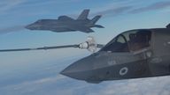 A view of Royal Air Force F-35 fighter jets taking part in air-to-air refuelling. 