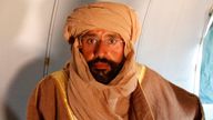 Saif al-Islam Gaddafi on a plane in Zintan 2011 after being captured by fighters who overthrew his father. Pic: Reuters