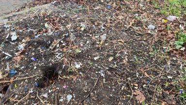 flower bed covered with cut plastic