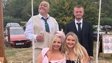 Mark Ashley (back left) with his family. Photo: PA