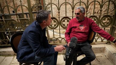 Mohammed Liftawi (R), who runs two shops, believes another war is imminent