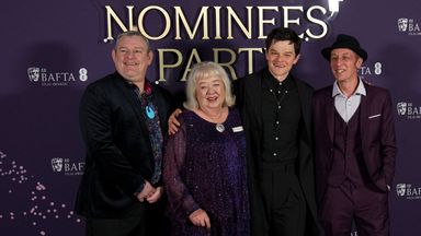 John Davidson, left, at the BAFTA film nominees party. Photo: Reuters