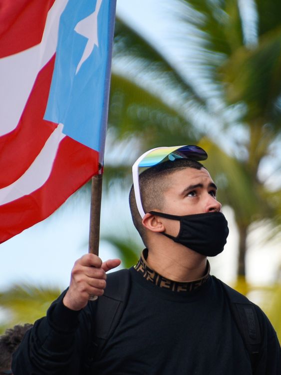 Benito Martinez, alias Bad Bunny, joins demonstrators during the fifth day of protests calling for the resignation of Governor Ricardo Rosse