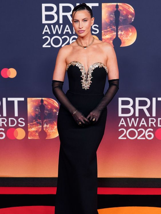 Presenter Ferne McCann oozing glamour in a strapless black gown and gloves. Pic: PA