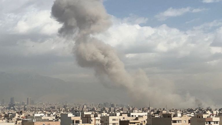 Smoke rises following an explosion in Tehran. Pic: Reuters