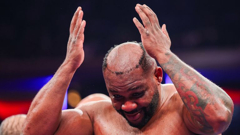 Jarrell Miller reacts to his toupee falling off in the heavyweight bout. Pic: Getty