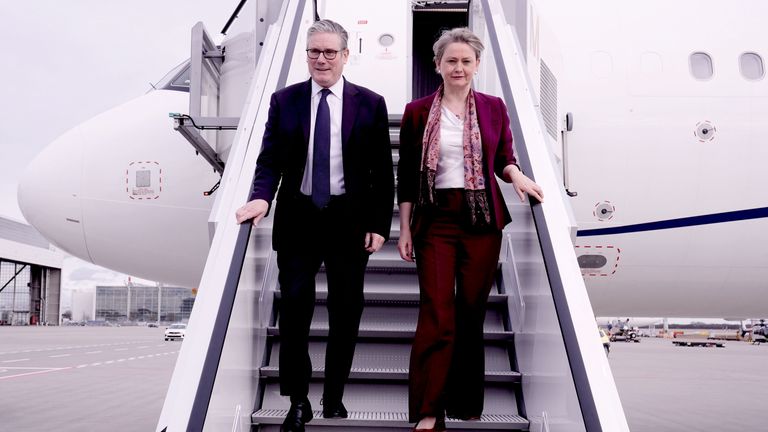 Keir Starmer and Yvette Cooper arriving at Munich Airport, Germany. Pic: PA