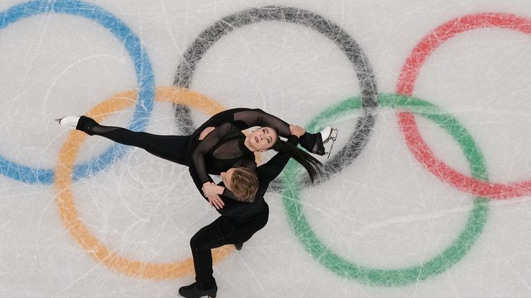 Lithuania's Allison Reed and Saulius Ambrulevicius limber up during a figure skating practice session: Pic: AP
