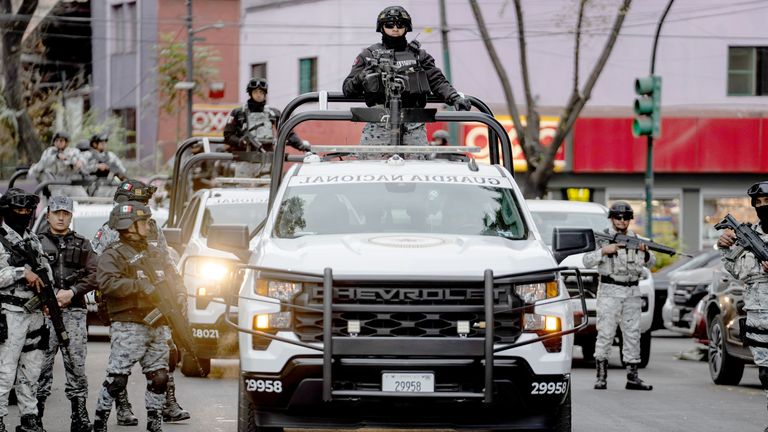 Members of the National Guard were deployed to the streets in the aftermath of the operation. Pic: AP