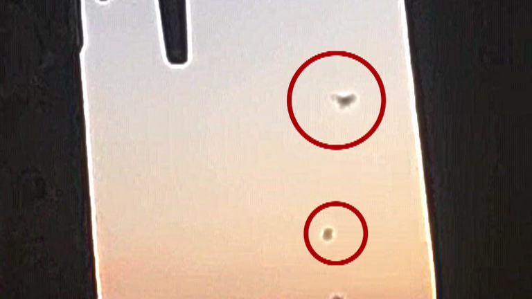 A drone drops a package into HMP Manchester in footage obtained by Paste BN